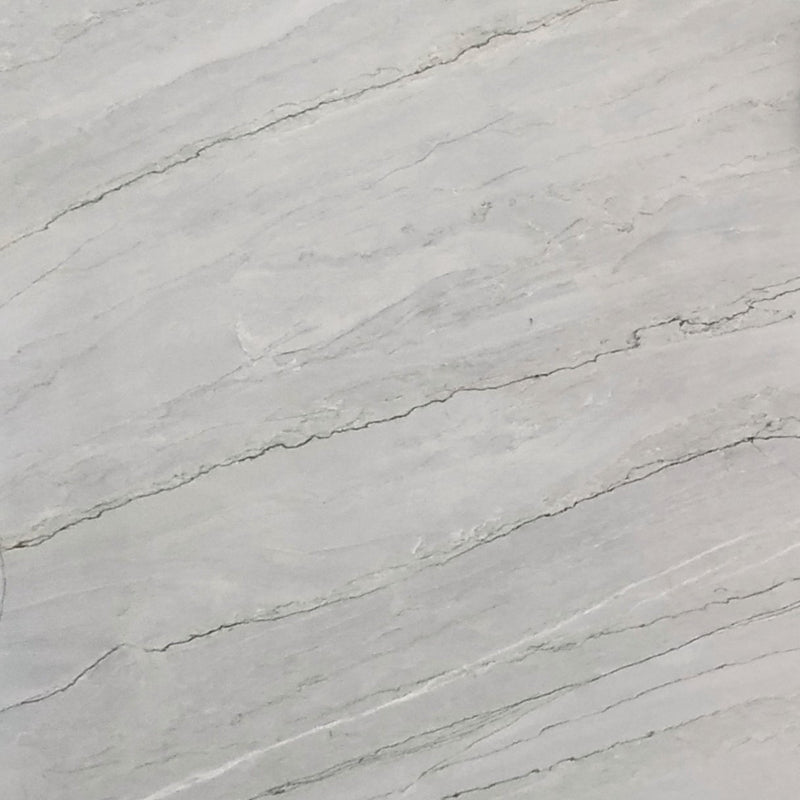 Azzura Bay Quartz – Hochwertiger Quarzstein mit sanften Blautönen und feiner Struktur, ideal für moderne Innenraumgestaltung.







