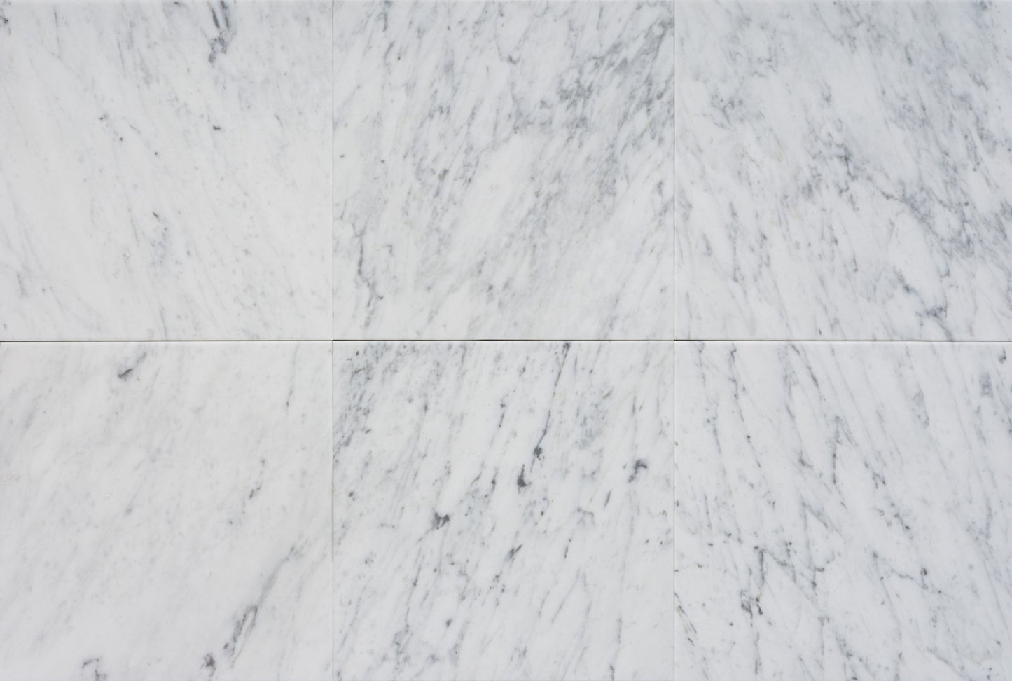 Naturstein Tilmes – Bianco Carrara C Marmor: Edle Fliesen & Naturstein mit feiner grauer Maserung. Ideal für luxuriöse Innenräume. Jetzt Angebot anfragen!

