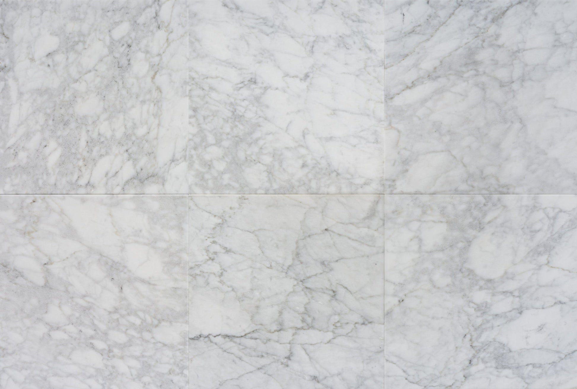 Naturstein Tilmes – Bianco Carrara Goia Marmor: Elegante Fliesen & Naturstein mit grauer Maserung. Ideal für Innenräume. Jetzt Angebot anfragen!

