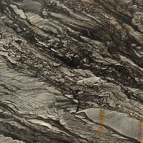 Black Sansalus Granit – Hochwertiger Naturstein mit schwarz-grauer Maserung und dynamischer Struktur, ideal für moderne Innen- und Außenbereiche.






