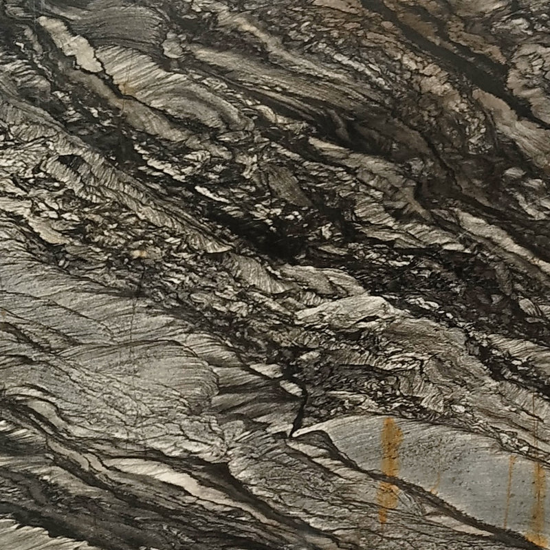 Black Sansalus Granit – Hochwertiger Naturstein mit schwarz-grauer Maserung und dynamischer Struktur, ideal für moderne Innen- und Außenbereiche.






