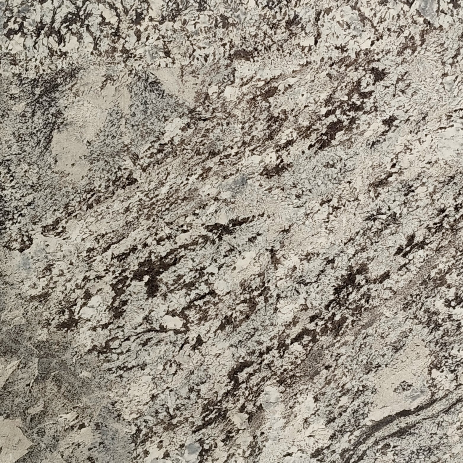 Lennon Granit – Hochwertiger Naturstein mit einzigartiger Maserung, ideal für moderne Innen- und Außenbereiche.

