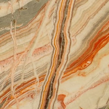 Picasso Onyx – Hochwertiger, transluzenter Naturstein mit einzigartiger Maserung, ideal für luxuriöse Innenraumgestaltung.

