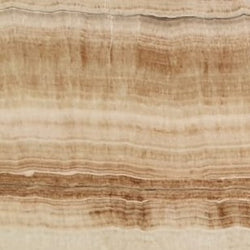 Terra Hill Onyx – Hochwertiger, transluzenter Naturstein mit einzigartiger Maserung, ideal für luxuriöse Innenraumgestaltung.

