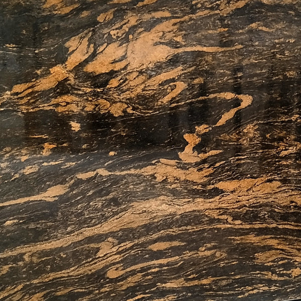 Titanius Granit – Hochwertiger Naturstein mit einzigartiger Maserung, ideal für moderne Innen- und Außenbereiche.

